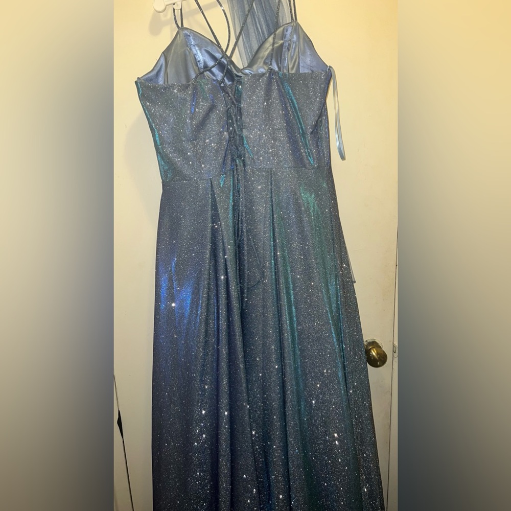 a beautiful blue glittery prom dress which changes color in the sunlight.